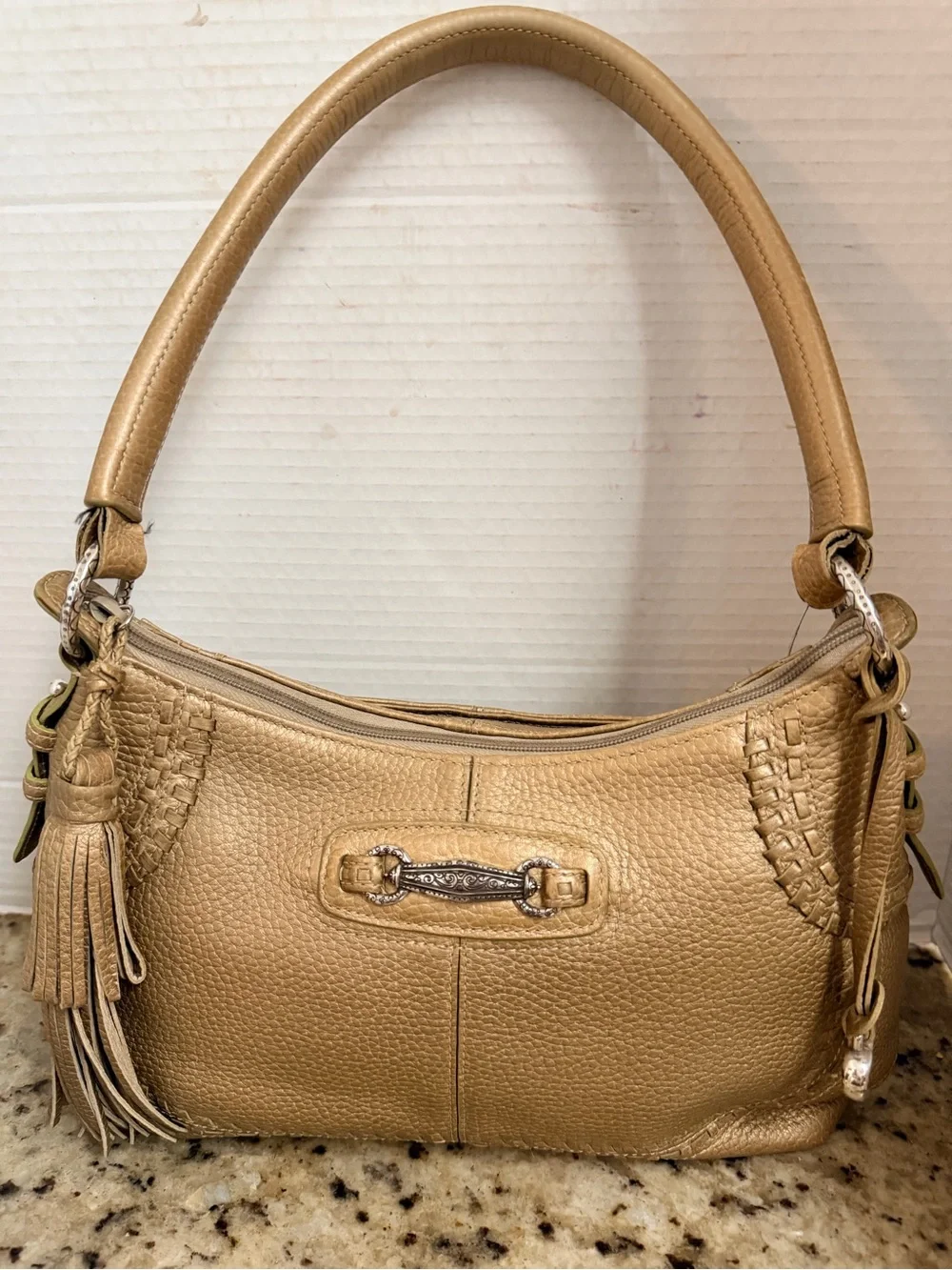 Brighton Gold Pebbled Leather Shoulder Bag with Tassel Accent